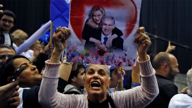 Israel election: Netanyahu claims victory after exit polls show a narrow lead