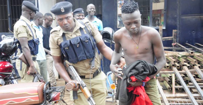 Curfew violators kept crammed together