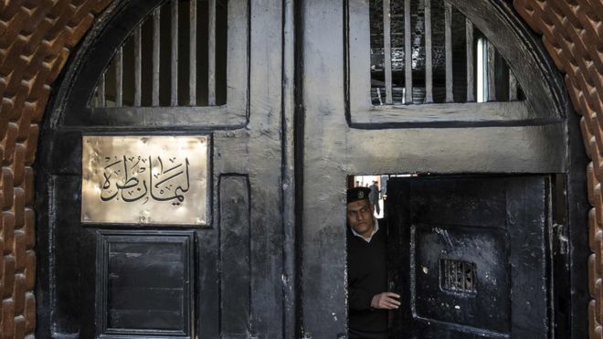 Egypt says jailed filmmaker who mocked Sisi died from alcohol poisoning