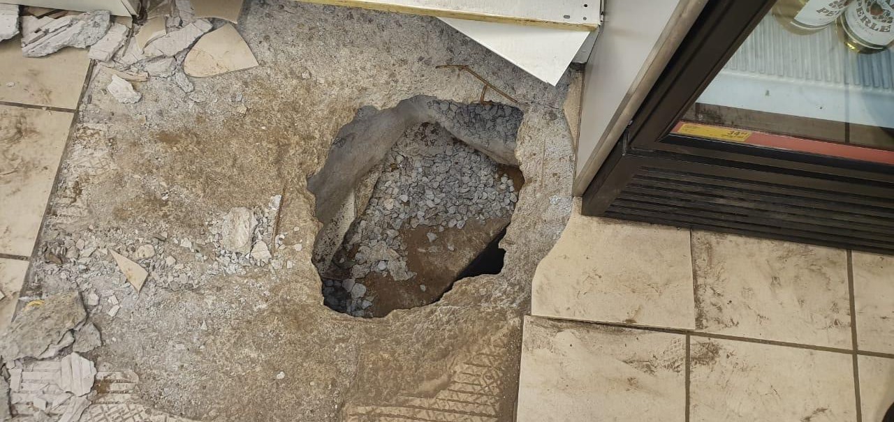 Thieves tunnel into South African liquor shop